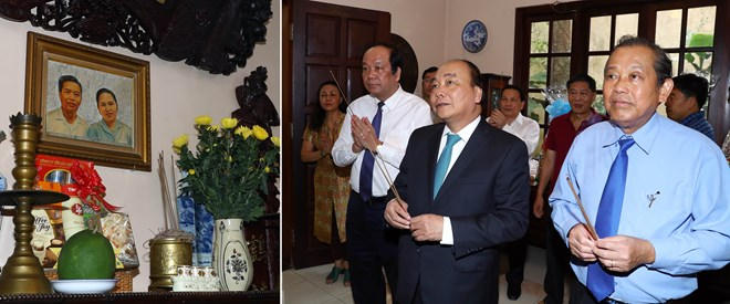 Thủ tướng Nguyễn Xuân Phúc đến dâng hương đồng chí Phạm Hùng. (Ảnh: Thống Nhất/TTXVN)