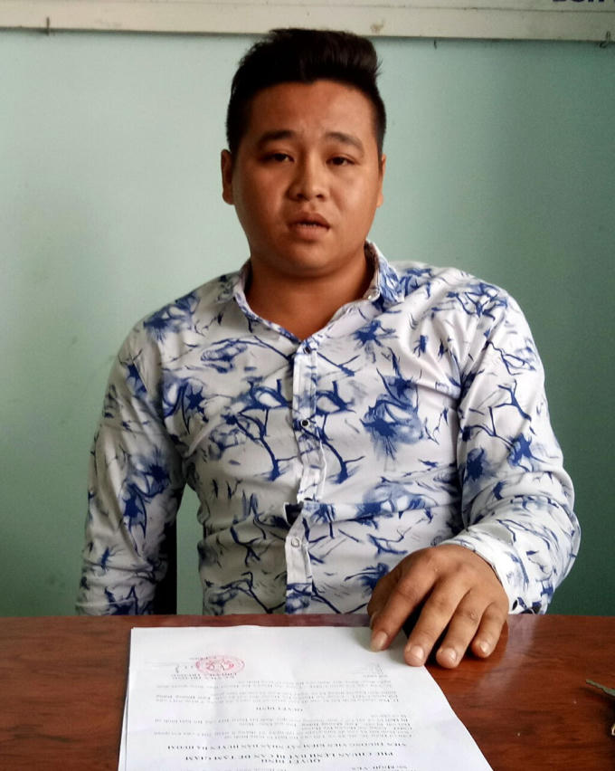 Lưu Quang Dũng tại cơ quan điều tra. ( Ảnh: báo Lâm Đồng)