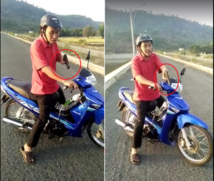 Người đàn ông liên tục dùng một vật giống súng chĩa vào người khác trong lúc nói chuyện. (Ảnh: Cắt từ clip).