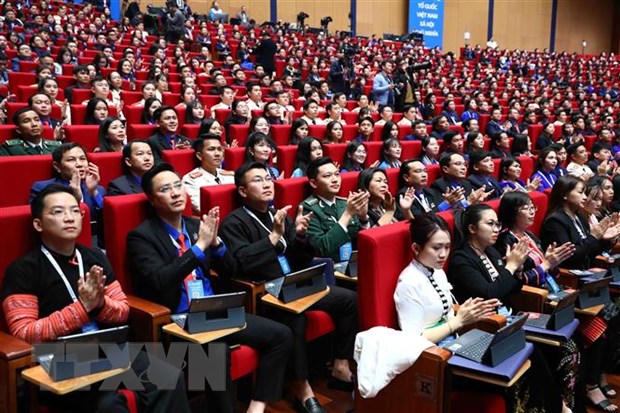 Các đại biểu thể hiện tinh thần, nhiệt huyết của tuổi trẻ tại đại hội. (Ảnh: Minh Đức/TTXVN)