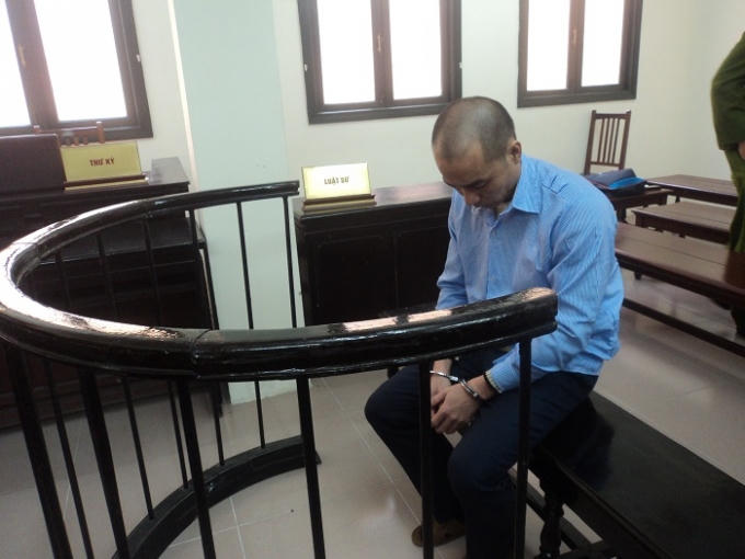 Bị cáo Lê Quang Vinh trước toà.