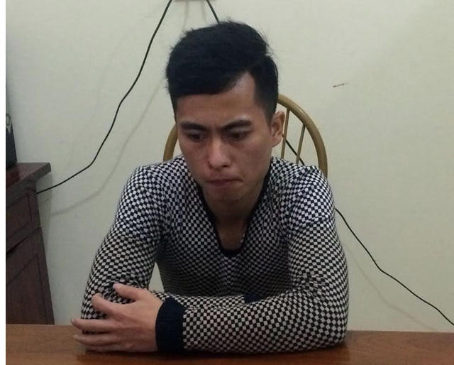 Đối tượng Ngô Văn Sơn tại cơ quan điều tra. (Ảnh: báo Dân trí)