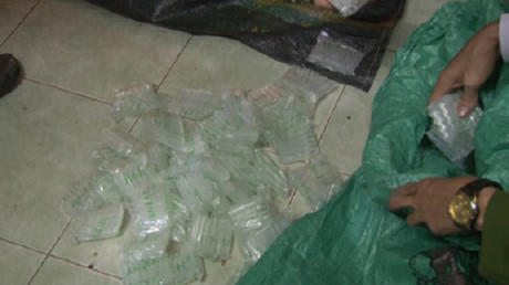 Những ống hóa chất không rõ nguồn gốc phát hiện ở nhà bà Hạnh.