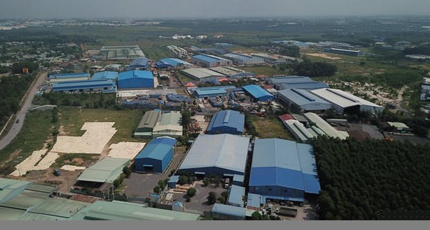 Hàng chục doanh nghiệp xây dựng nhà xưởng trong khu đất quy hoạch cụm công nghiệp Phước Tân chưa được cấp phép. (Ảnh: Sỹ Tuyên/TTXVN)
