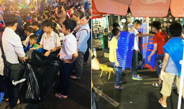 Trẻ em nán lại nhặt rác và thu dọn ghế ngồi sau sự kiện. Hình ảnh này được ban quản lý Đường sách lưu giữ lại.