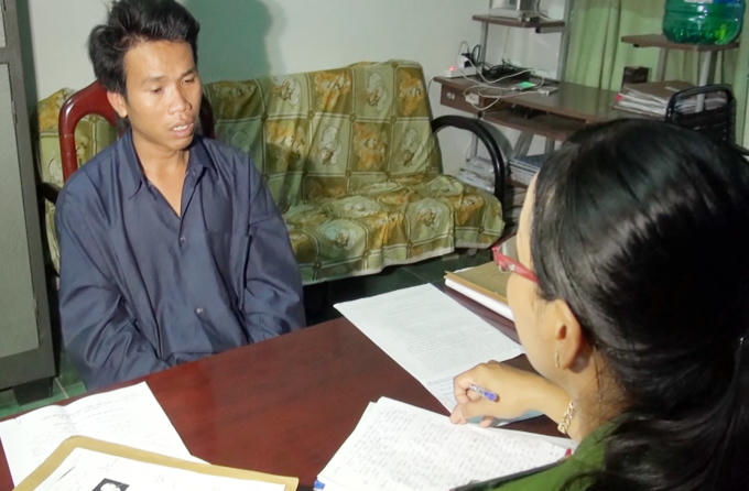 Nguyễn Văn Tuấn tại cơ quan công an.