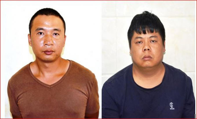 Hai đối tượng Yang Chang Cai và Lian Yu tại CQĐT (ảnh Xuân Bắc).