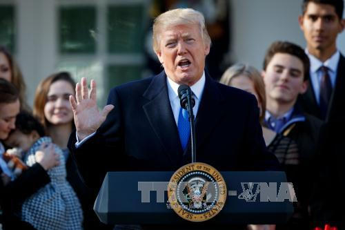Tổng thống Donald Trump tại cuộc họp báo ở Washington D.C ngày 19/1. Ảnh: THX/TTXVN