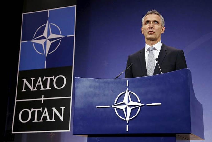 Tổng thư ký NATO Jens Stoltenberg phát biểu về "chiến tranh hybrid" (Ảnh: Reuters)