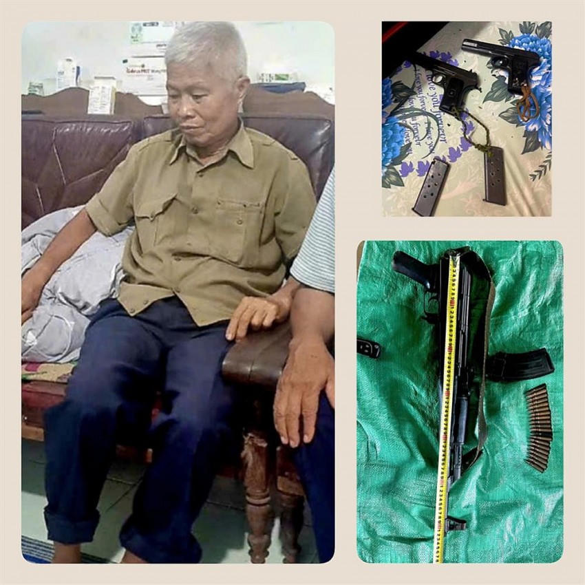 Đối tượng Đặng Thanh Quý cùng 3 khẩu súng tàng trữ trái phép tại thời điểm kiểm tra và bị lực lượng chức năng thu giữ. Ảnh: BCA.