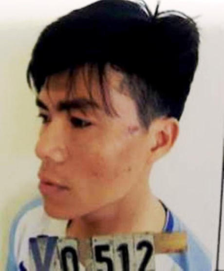 Hoàng Văn Hiệu người đấm vào mặt cảnh sát cơ động khi bị mời về trụ sở làm việc.