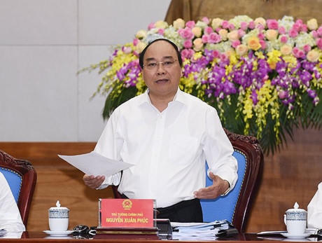 Thủ tướng Nguyễn Xuân Phúc chưa kết luận về Thông tư 20. Ảnh Chinhphu.vn