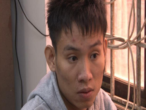 Lê Minh Đoàn tại cơ quan công an.