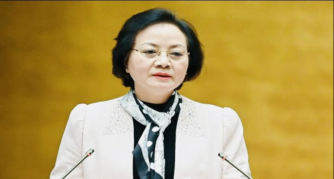 Bộ trưởng Nội vụ Phạm Thị Thanh Trà trình bày tờ trình của Chính phủ về việc thành lập, nhập các đơn vị hành chính đô thị của 9 địa phương tại Quốc hội.