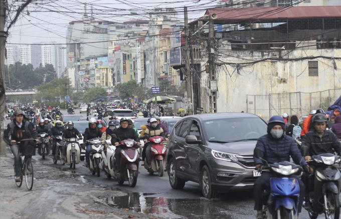 Xe máy đang là phương tiện chủ yếu của người dân. Ảnh: Trần Vương.