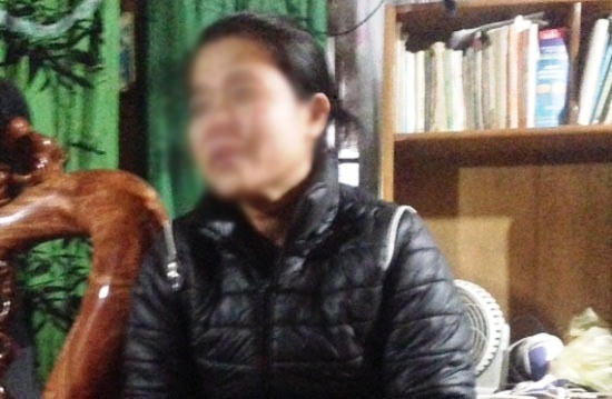 Chị D. tại cơ quan điều tra. Ảnh: Lê Anh