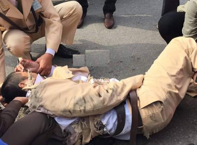 Thượng úy Đạt bị thương nặng sau khi bị kéo lê trên đường hàng chục mét.