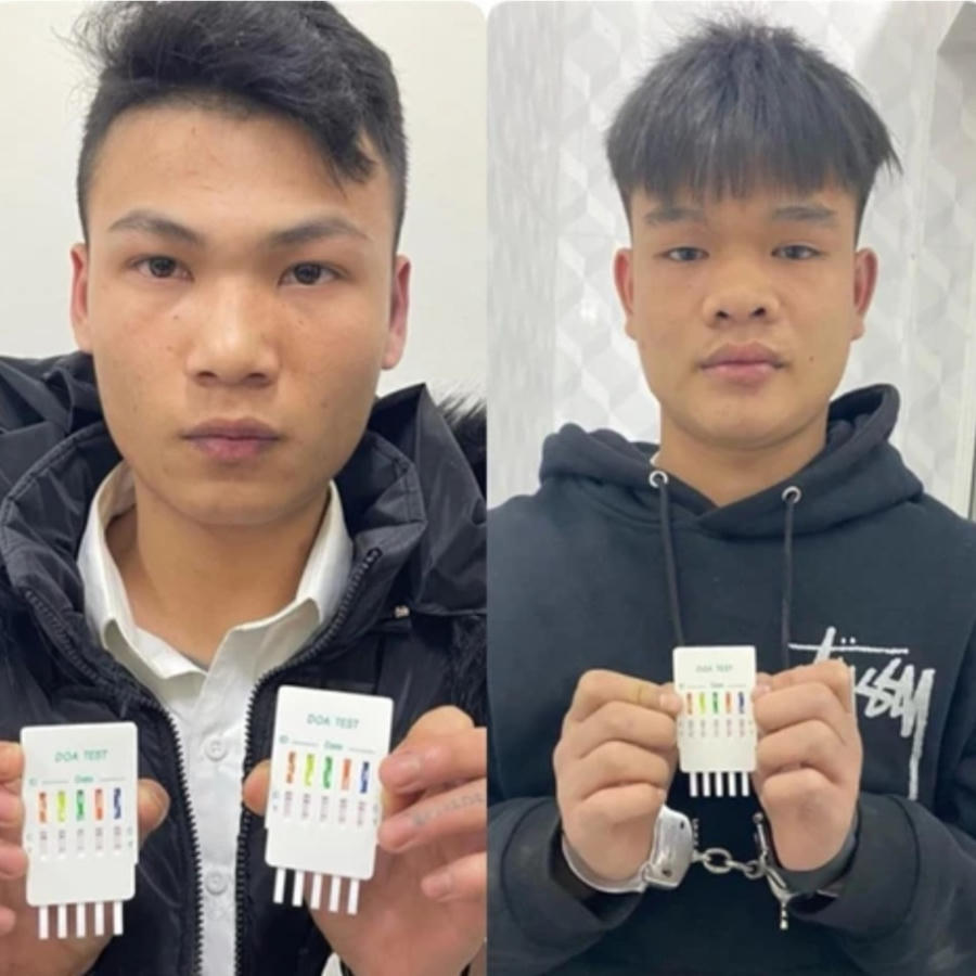 Phan Hải Quân và Lò Văn Quý tại cơ quan công an.