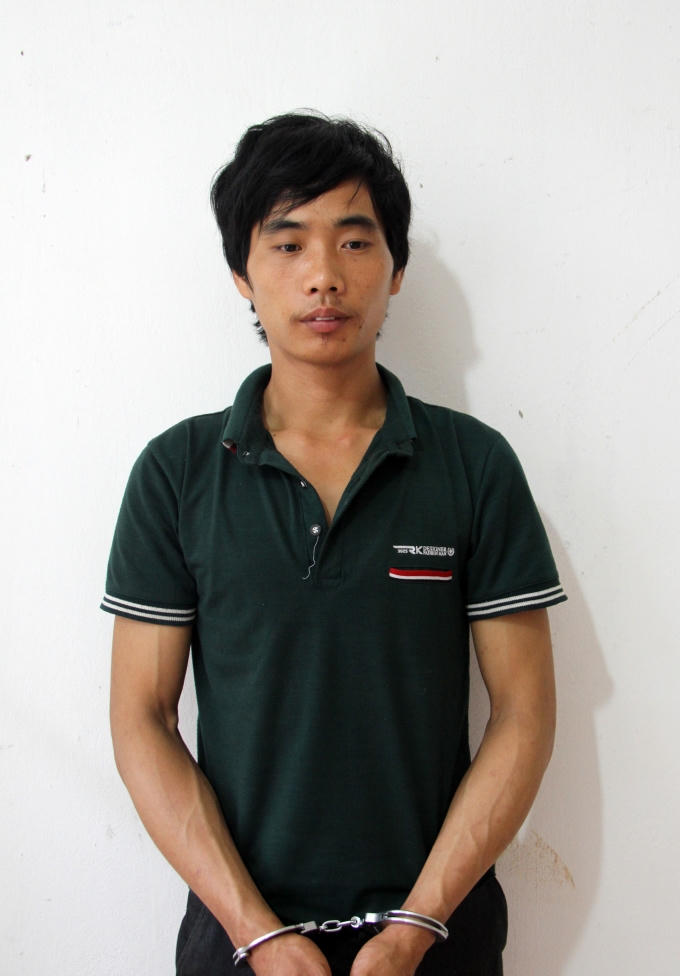Tẩn Láo Lở tại cơ quan điều tra. Ảnh: Công an tỉnh Lào Cai.