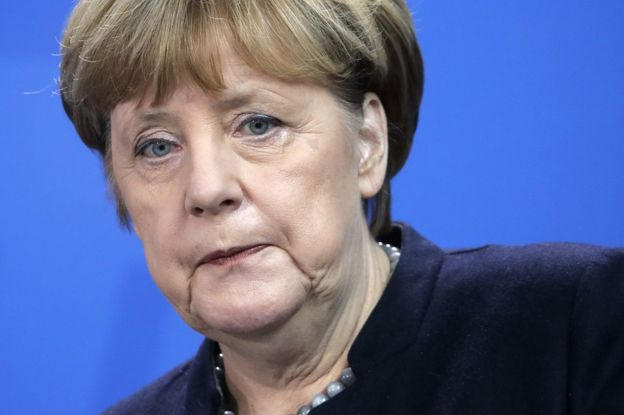 Tổng thống đắc cử Donald Trump chỉ trích việc bà Merkel tiếp nhận hơn 1 triệu người tị nạn là sai lầm thảm họa. (Ảnh: AP)