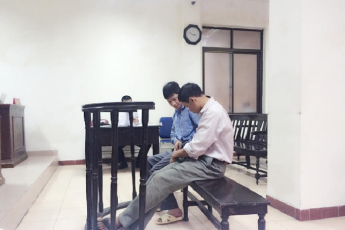 Bị cáo Nguyễn Văn Nhâm và Nguyễn Đình Yên tại phiên tòa phúc thẩm ngày 9/11.