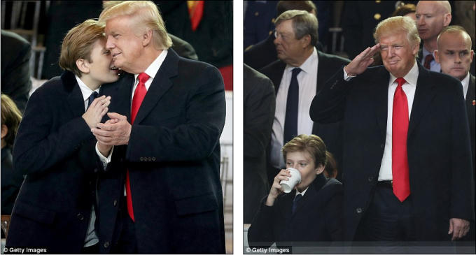 Barron Trump - cậu con trai 10 tuổi chia sẻ một giây phút riêng tư với cha của mình. Hai cha con uống chung một ly nước ấm khi đoàn diễu hành tới Nhà Trắng. (Ảnh: Getty Images)