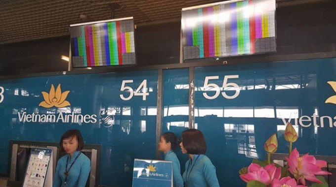 Hệ thống bảng điện tử của sân bay Nội Bài bị virus xâm nhập không hiển thị nội dung.