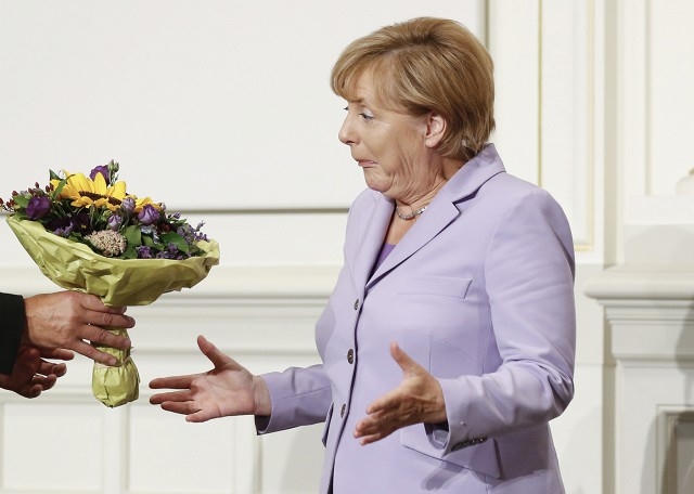Cảm xúc của Thủ tướng Đức Angela Merkel khi nhận được bằng tiến sỹ tại Đại học Bern,Thụy Sỹ (Ảnh: EAP)