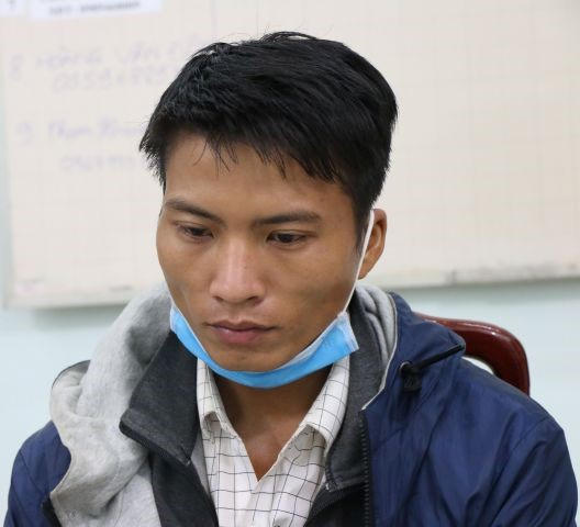 Nghi can Nguyễn Thanh Tùng tại cơ quan Công an.
