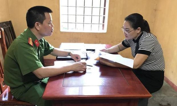 Tạm giam nguyên nữ cán bộ viện kiểm sát lừa bán đất. (Ảnh Báo Dân trí)