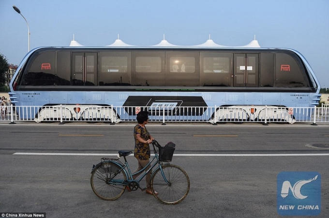 Với toàn bộ hệ thống được cung cấp năng lượng điện, TEB-1 giúp khắc phục tình trạng ô nhiễm môi trường đang ở mức báo động của Trung Quốc. (Ảnh: New China)