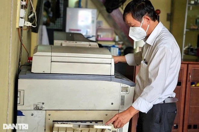 Ông Nguyễn Văn Thành - Chủ tiệm photocopy cho biết, rất vui mừng khi được nhận hỗ trợ từ gói 26.000 tỷ đồng (Ảnh: Khánh Hồng).