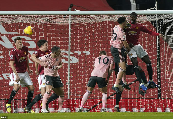 38560818-9193031-Sheffield_United_s_Kean_Bryan_centre_opens_the_scoring_in_the_23-a-47_1611785556865