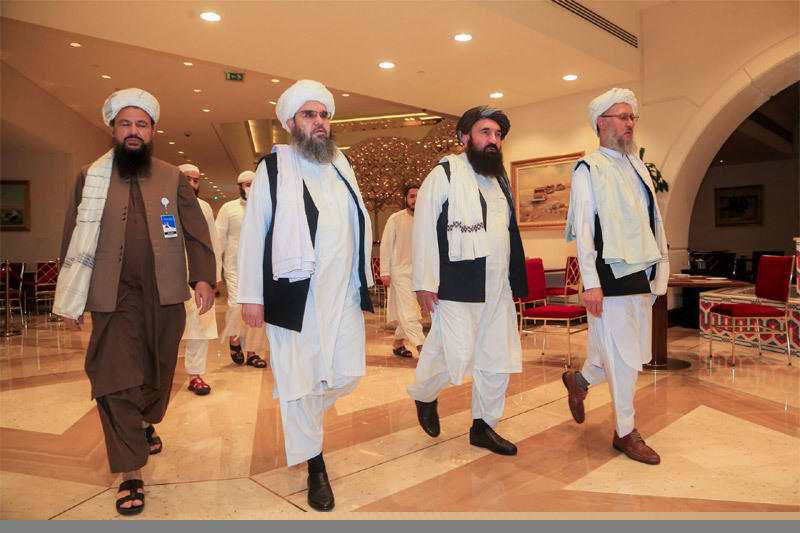 Các quan chức Taliban tham dự cuộc đàm phán với đại diện Chính phủ Afghanistan ở Doha, Qatar ngày 12/8. Ảnh: Reuters