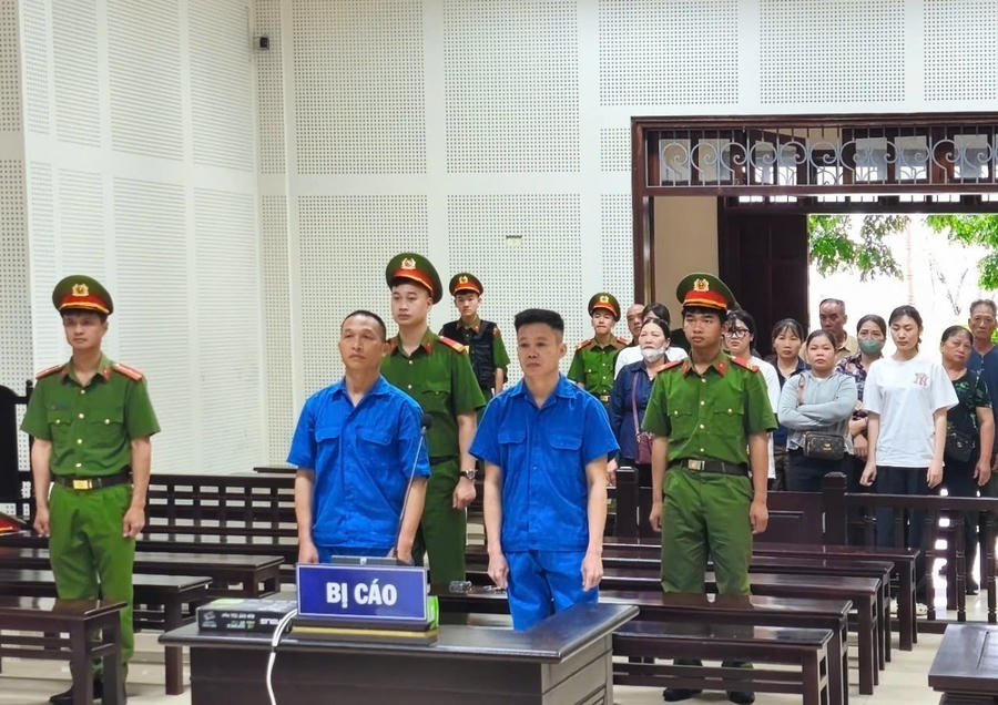 2 bị cáo Phạm Văn Vũ và Hoàng Đức Minh tại phiên tòa.