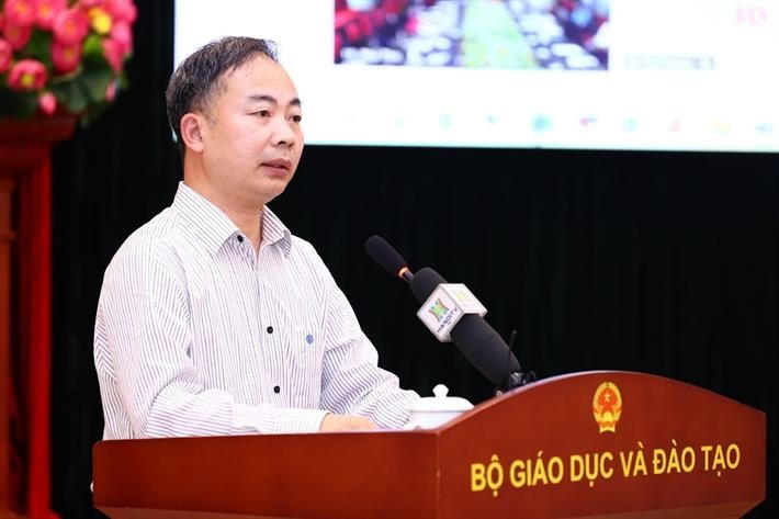 Phó Cục trưởng Nguyễn Ngọc Hà báo cáo về công tác tổ chức thi tốt nghiệp THPT.