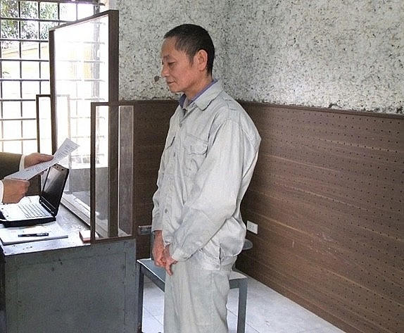 Lý Kim Minh tại cơ quan điều tra.