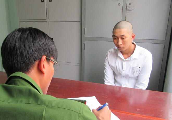 Nguyễn Quốc Duy tại cơ quan công an. (Ảnh: Zing.vn)
