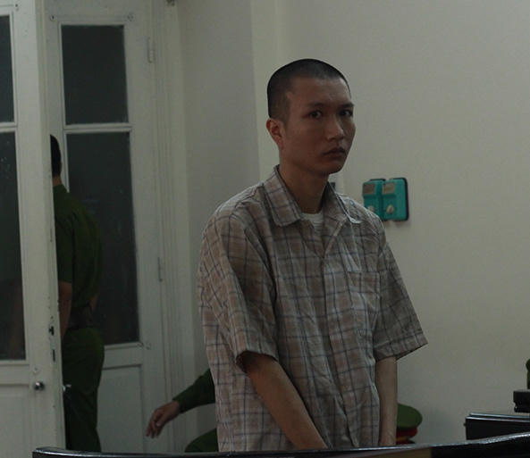 Lê Hoàng Hiệp trong phiên tòa xét xử sáng nay (Ảnh: Duy Khương)