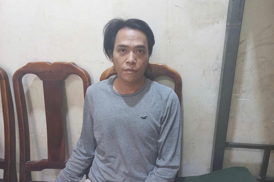 Huynh tại cơ quan công an.