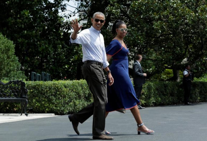 Tổng thống Obama và Đệ nhất phu nhân trong 1 chuyến công du nước ngoài. (Ảnh: Reuters)
