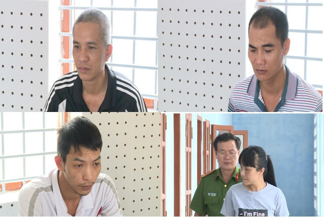 4 đối tượng: Đặng Anh Dũng, Nhâm Hải Quân, Đỗ Thị Hằng, Đinh Văn Tuấn trước Cơ quan Cảnh sát điều tra (ảnh: Trung Thành).