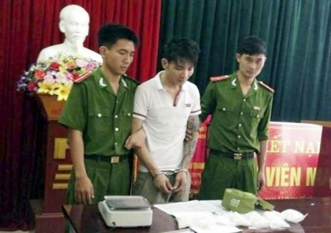 “Ông trùm” Trần Mạnh Tài lúc bị bắt giữ.