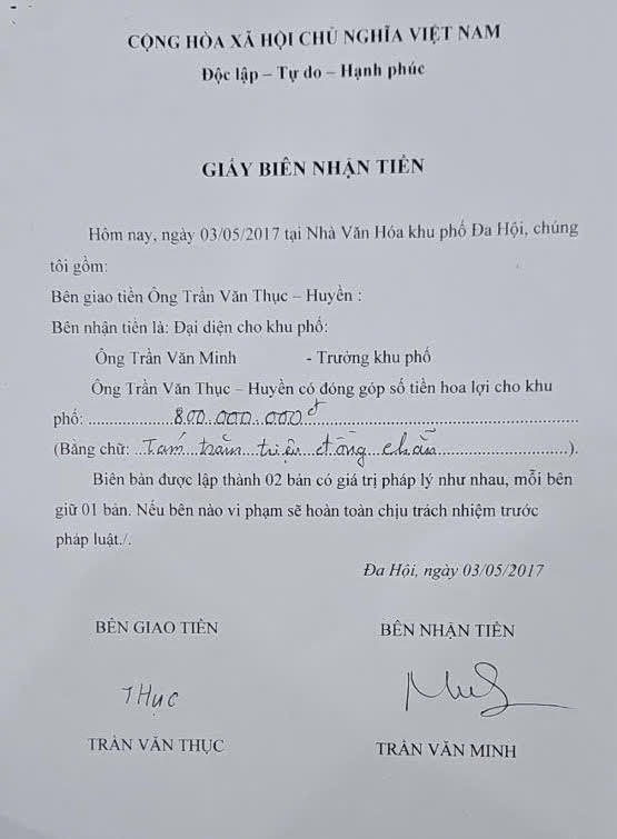 Ông Trần Văn Minh ký “Giấy nhận tiền” với số tiền 800 triệu đồng.
