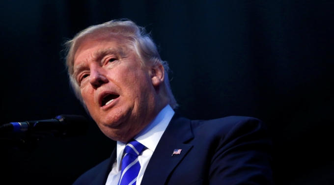 Tỷ phú Donald Trump cáo buộc Tổng thống Obama là cha đẻ của IS. (Ảnh: Reuters)