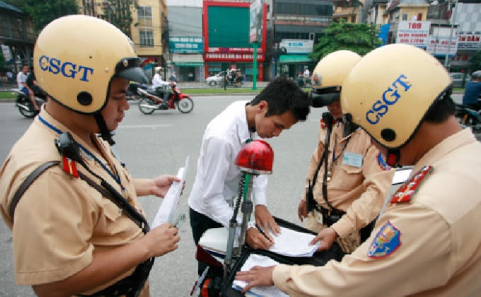 CSGT chỉ được trưng dụng phương tiện khi có quyết định của Bộ trưởng Bộ Công an (Ảnh minh họa).