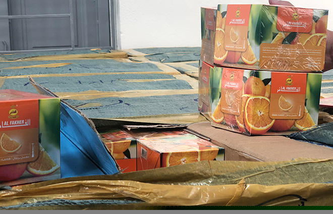 Những hộp giấy in hình hoa quả bên trong chứa shisha. Ảnh: CAND.