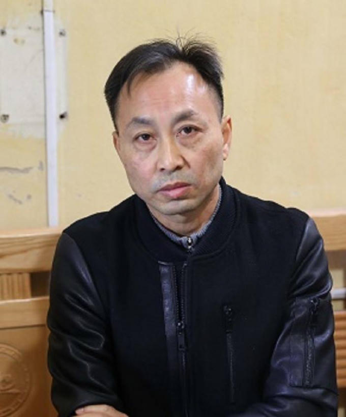 Đối tượng bị bắt Huang Jian Rong.