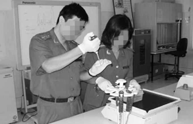 Giám định viên tư pháp thực hiện nhiệm vụ. (Hình minh họa)