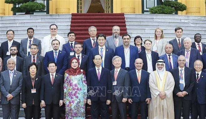 Chiều 19/9/2018, tại Phủ Chủ tịch, Chủ tịch nước Trần Đại Quang tiếp Trưởng đoàn các Cơ quan Kiểm toán tối cao châu Á nhân dịp tham dự Đại hội Tổ chức các Cơ quan Kiểm toán tối cao châu Á (ASOSAI) lần thứ 14. Ảnh: TTXVN